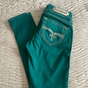 Rock Revival Turquoise jeweled skinny/jegging pants. Size 25